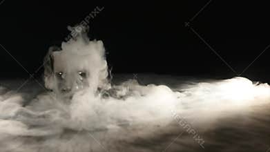 Drink in glass with the effect of dry ice