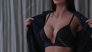 Beautiful young girl showing her breasts