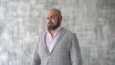 Close up portrait of a young man. body language and gestures. he is disgusted.
