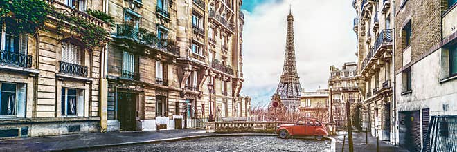 The eifel tower in Paris from a tiny street