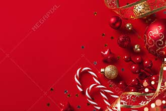 Christmas card or banner. Christmas decorations on red background