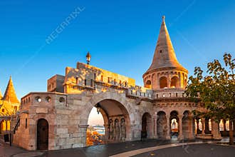Budapest, Hungary - Entrance and tower of the famous Fisherman`s Bastion on a golden autumn sunrise