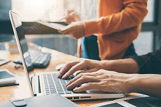 Professional Development programmer cooperating meeting and brainstorming and programming website working in a software and