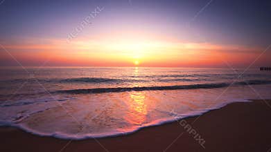 Tropic sunrise with dramatic clouds over the sea waves and beach, 4k footage video