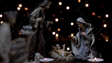 Nativity scene Christmas manger with candles lights