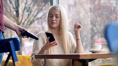 Mobile payment concept. Person making wireless payment with phone.