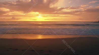 Aerial panoramic view of sunset over atlantic ocean