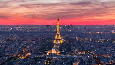 Panorama of Paris after sunset day to night timelapse. Eiffel tower view from montparnasse building in Paris - France