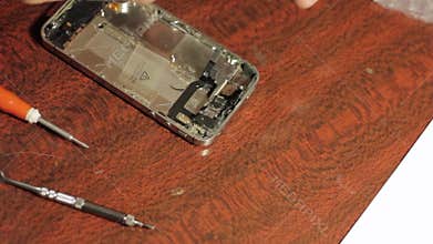 Chips and details of the smartphone. Master disassembled mobile device for detail.