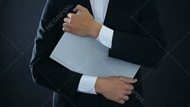 Man protecting laptop computer, information security antivirus, private access