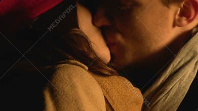 Beloved man and woman kissing, happy couple in love dating, evening outdoor