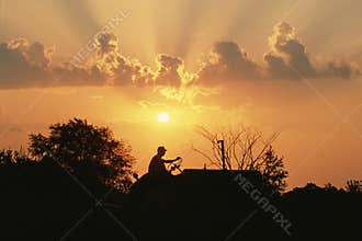 Farmer on Tractor