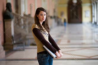 Looking sad with notebook