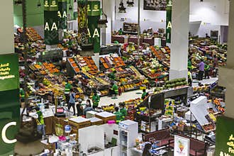 Dubai, UAE - 07.07.2021 - Customers and vendors at Waterfront market, fruits and vegetables section. Market