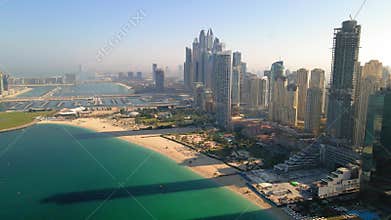 JBR beach and Dubai Marina skyscrapers aerial view