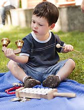 Child with musical instruments