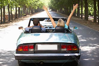 Couple in sports car