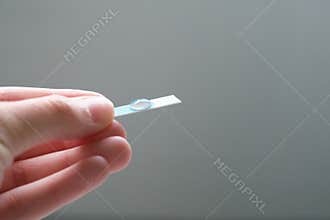 Hand holding biomaterial 3D printed onto a nano electrode