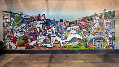 Energetic sports mural with all the iconic Texas Rangers players inside Globe Life Field in Arlington, Texas.