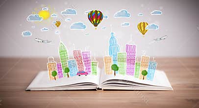 Cityscape drawing on open book