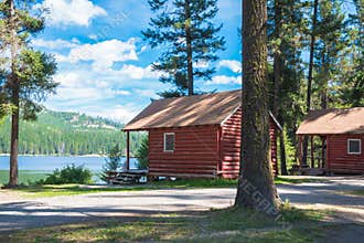 Log Cabins in Forest and on Lake