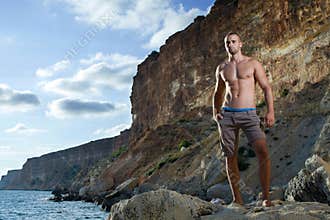 Bodybuilder with naked torso