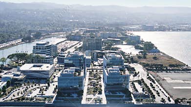 Aerial view of Meta Reality Labs in Burlingame, California, along the San Francisco Bay, featuring a canal, suburban backdrop, and