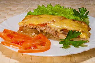 Fish baked under cheese