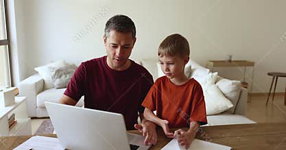 Family using laptop for leisure, education or work