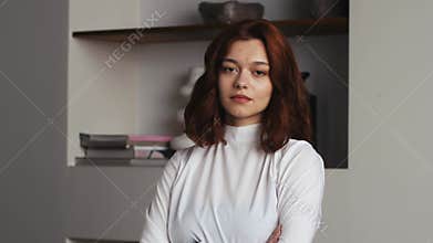 Business portrait in office Caucasian girl smiling happy businesswoman cheerful woman smile at workplace feminism power