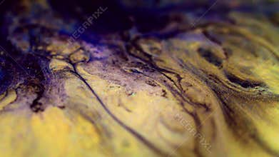Ink drip sparkling oil flow black blue yellow leak