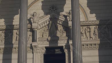 Architectural Detail of Historic Building Facade embellished with Columns and Sculptures