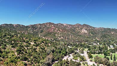 Fly Up Shot Over Griffith Park with Hollywood Mountains in the Background