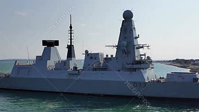 Royal Navy destroyer enters Portsmouth Harbour UK