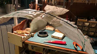 Iron bird falcon in flight, automaton