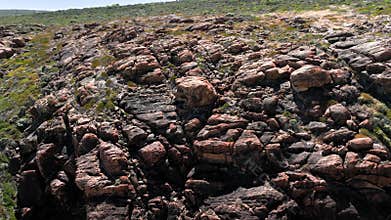 Aerial of Rugged rocky cliffs seen between Margaret River and Naturaliste wilds