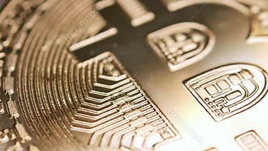 Bitcoin BTC coin and 100 dollars bills.