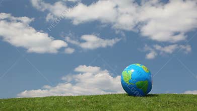 globe looking inflatable ball waving by wind on