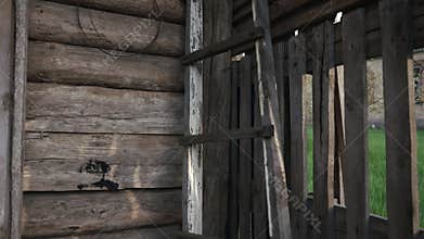 A corner inside an old, abandoned barn.