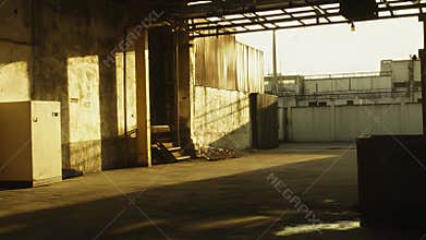 Industrial urban decay area bathed in golden sunlight