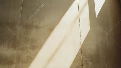 Warm sunbeam falling on rustic wood wall