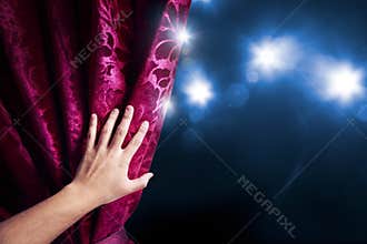 Theater curtain with dramatic lighting