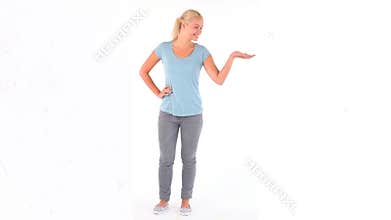 Blonde woman showing a blank space