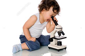 Baby with microscope.