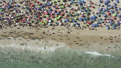 Aerial view of a crowded shoreline over the Ipanema beach in Rio de Janeiro Brazil