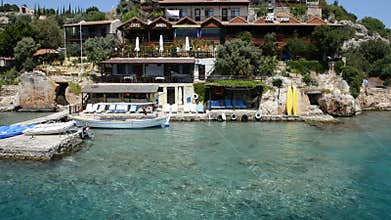 The turquoise water near beach and outdoor restaurants in Kekova