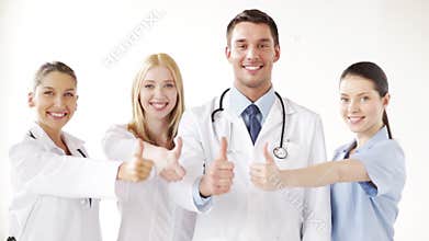 Group of doctors with thumbs up