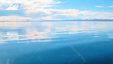 Calm Blue Seascape with Crystal Clear Reflective Water and Expansive Sky