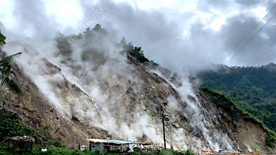 geothermal hot springs steam emissions with hydrogen sulfide in the mountains of the Philippines Asia