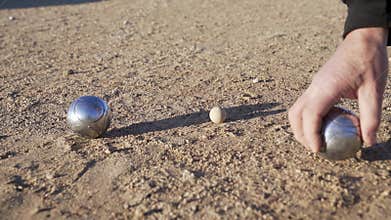 Petanque, Pétanque balls lead slow motion on the playground